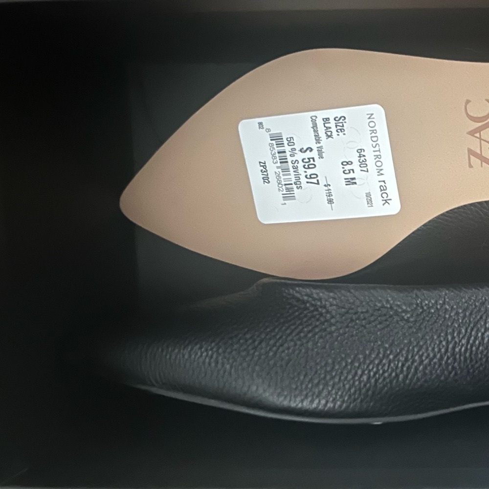 Brand new never worn Zac Posen flats with silver toggle ankle wrap